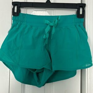 Lululemon Hotty Hot Shorts in Teal, low-rise waist, 2.5” inseam. Size 4.